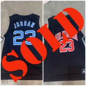 Blue and Red Jordan 23 jersey.